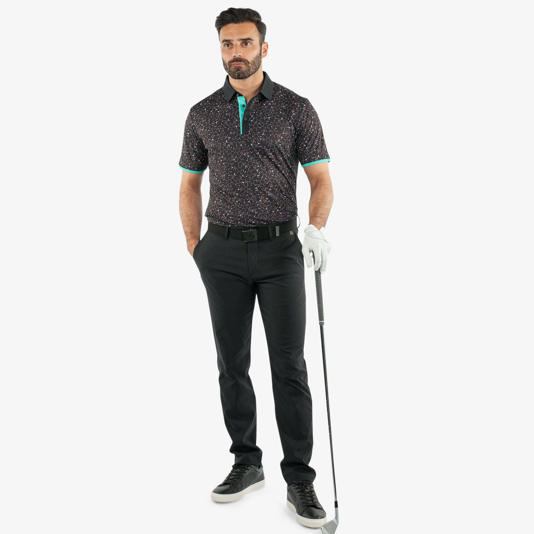 Mannix is a Breathable short sleeve golf shirt for Men in the color Black/Atlantis Green(2)