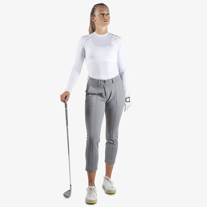 Ella is a UV protection golf top for Women in the color White(2)