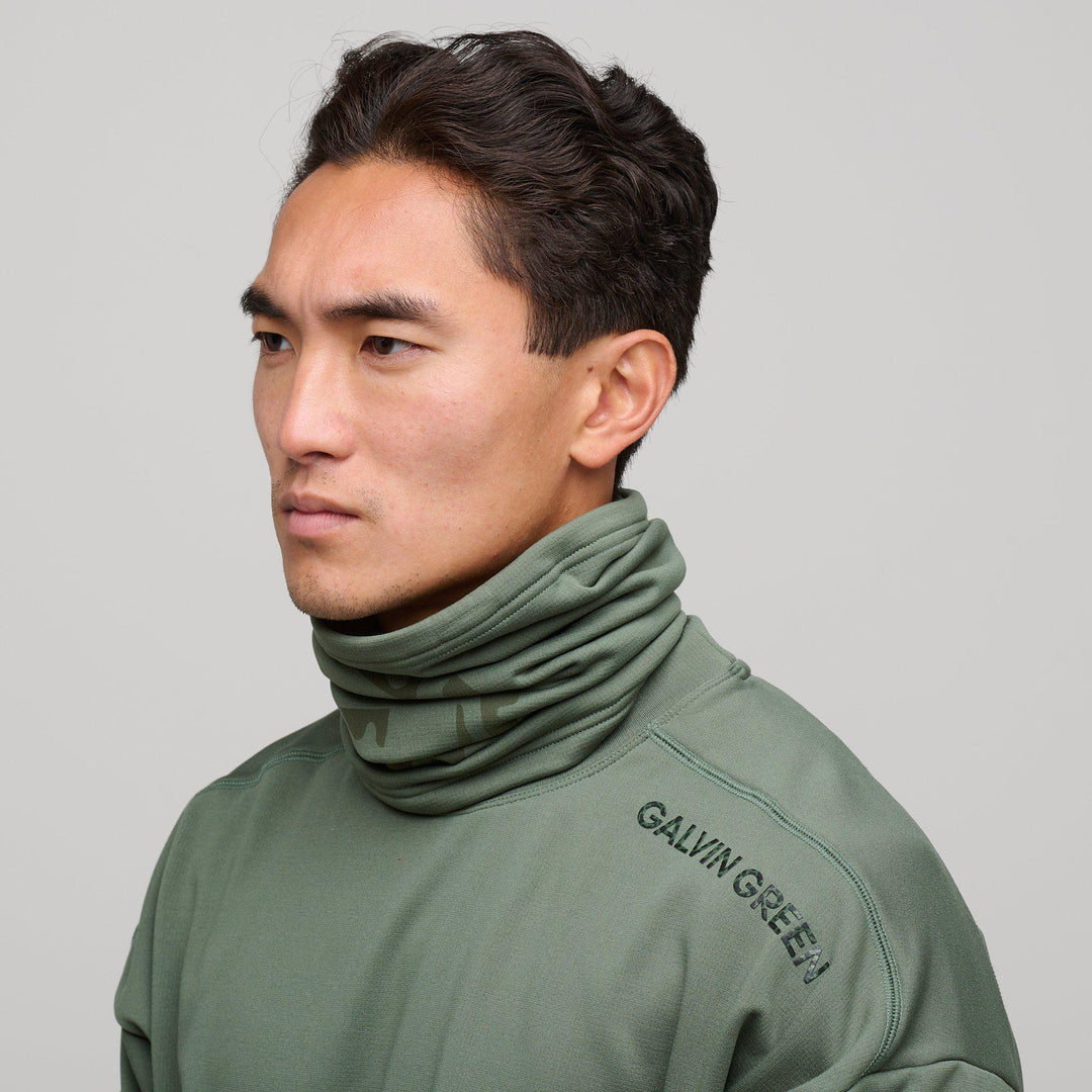 Derek is a Insulatin neck warmer in the color Duck Green(2)