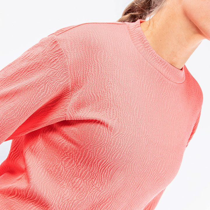 Dalia is a Insulating mid layer for Women in the color Sugar Coral(4)