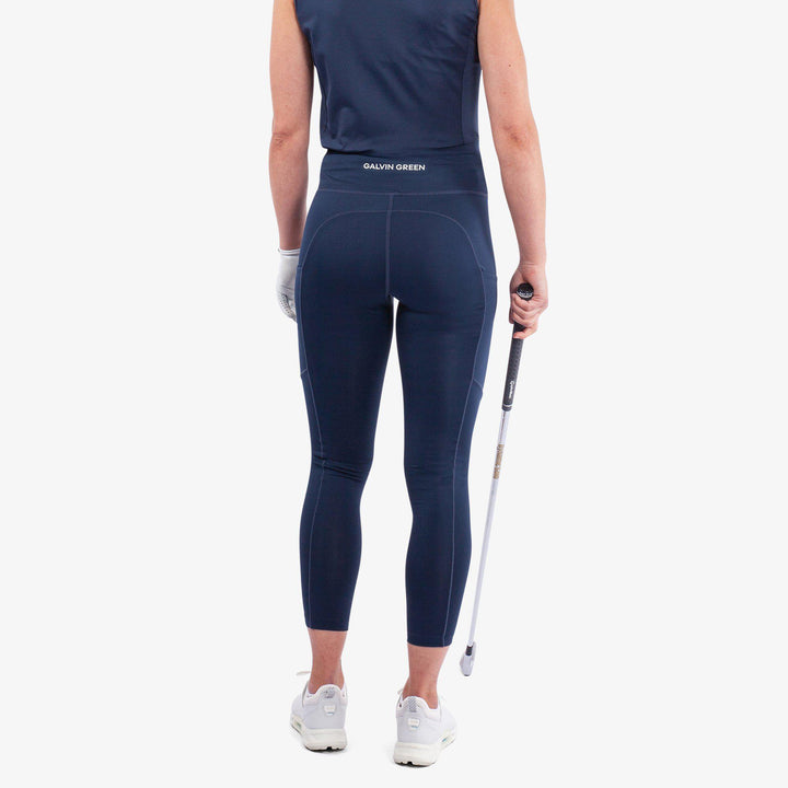 Nicoline is a Breathable and stretchy golf leggings for Women in the color Navy(5)