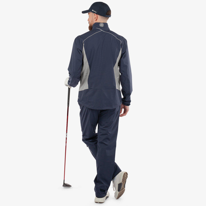 Ames is a Waterproof golf jacket for Men in the color Navy/Cool Grey(9)