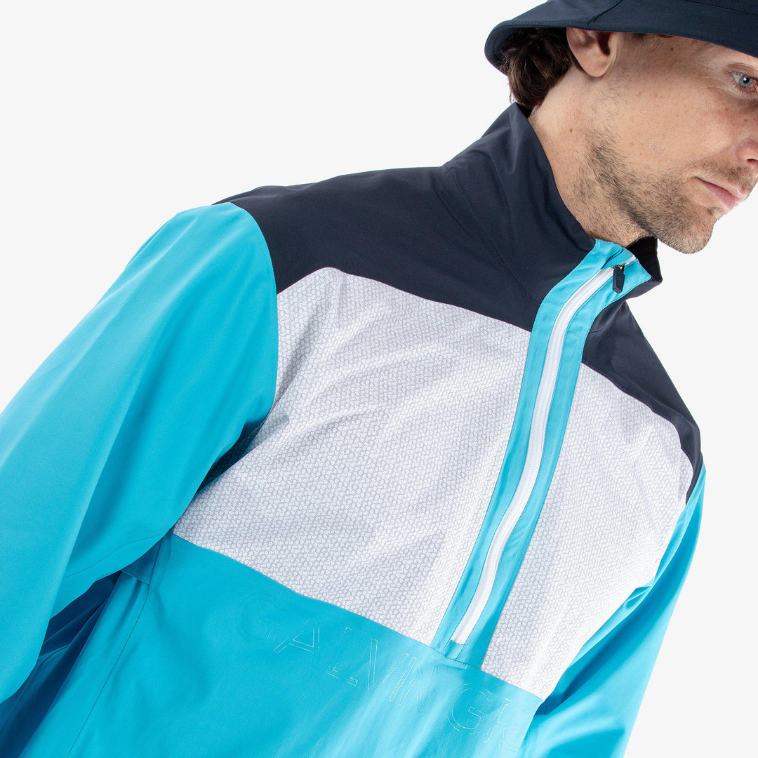Ashford is a Waterproof golf jacket for Men in the color Aqua/Navy/White(3)