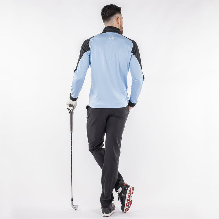 Daxton is a Insulating golf mid layer for Men in the color Amazing Blue(9)