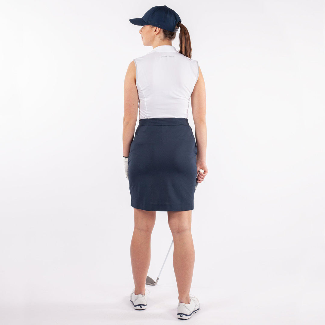 Mila is a Breathable sleeveless golf shirt for Women in the color White(4)