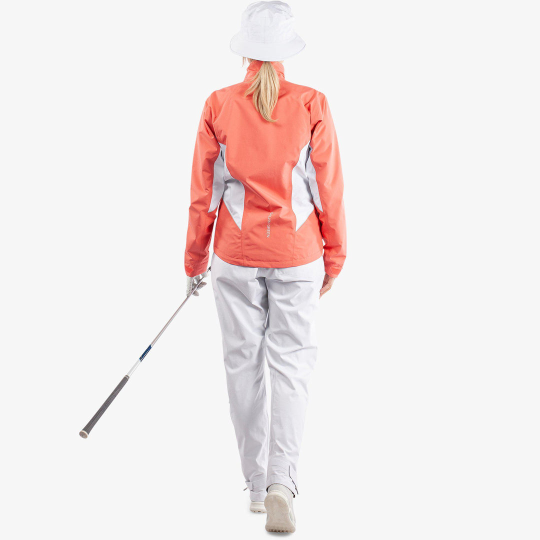 Aida is a Waterproof golf jacket for Women in the color Coral/White/Cool Grey(9)