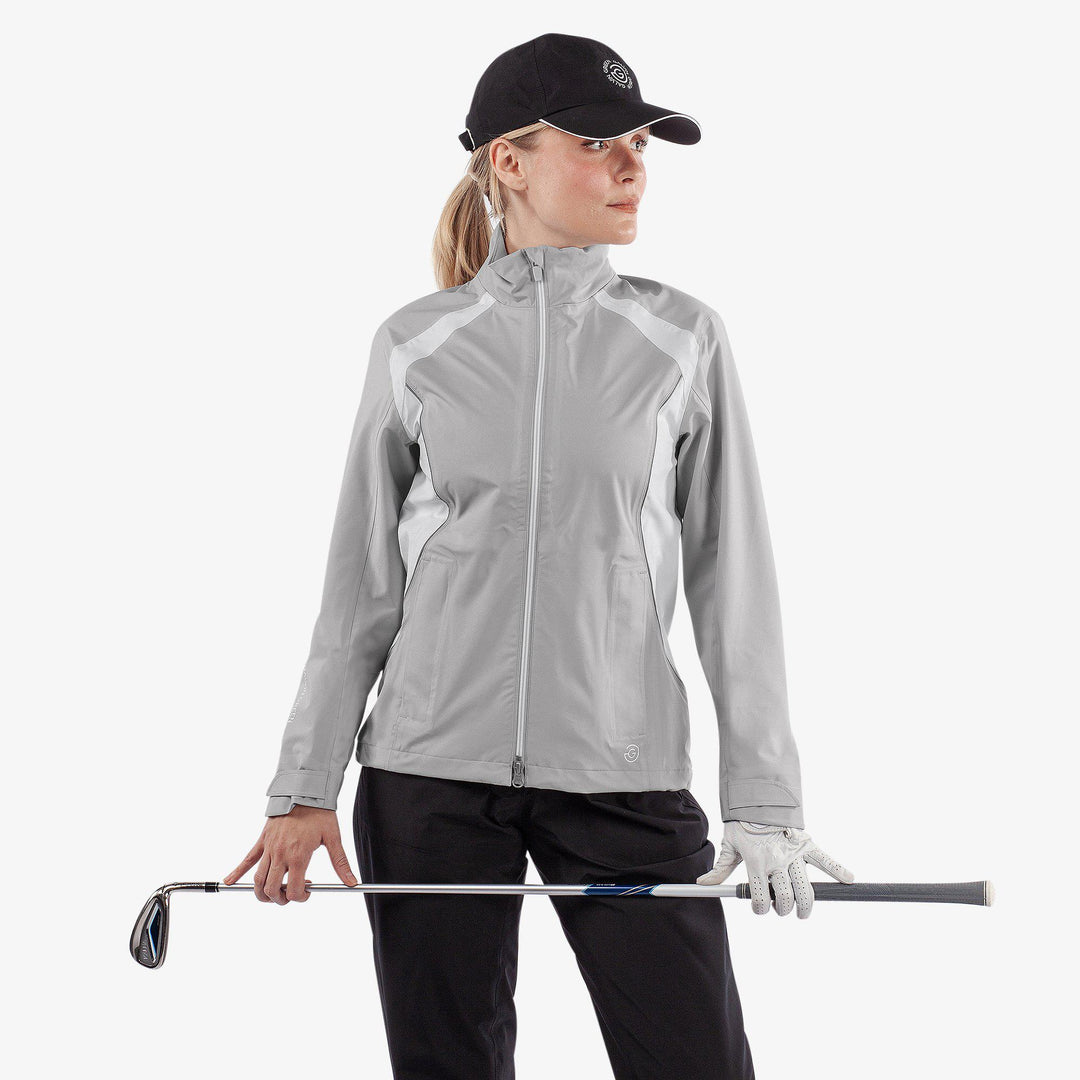 Amy is a Waterproof golf jacket for Women in the color Cool Grey/White(1)