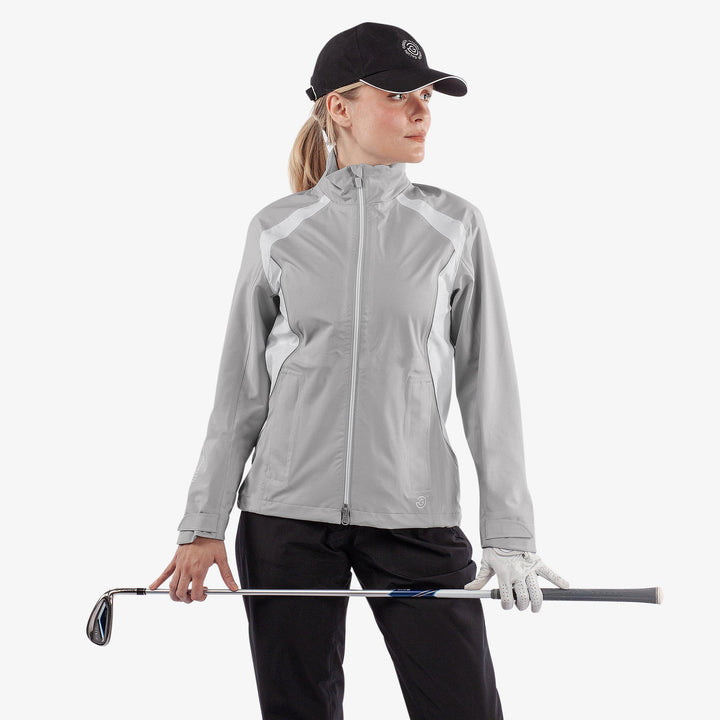 Amy is a Waterproof golf jacket for Women in the color Cool Grey/White(1)