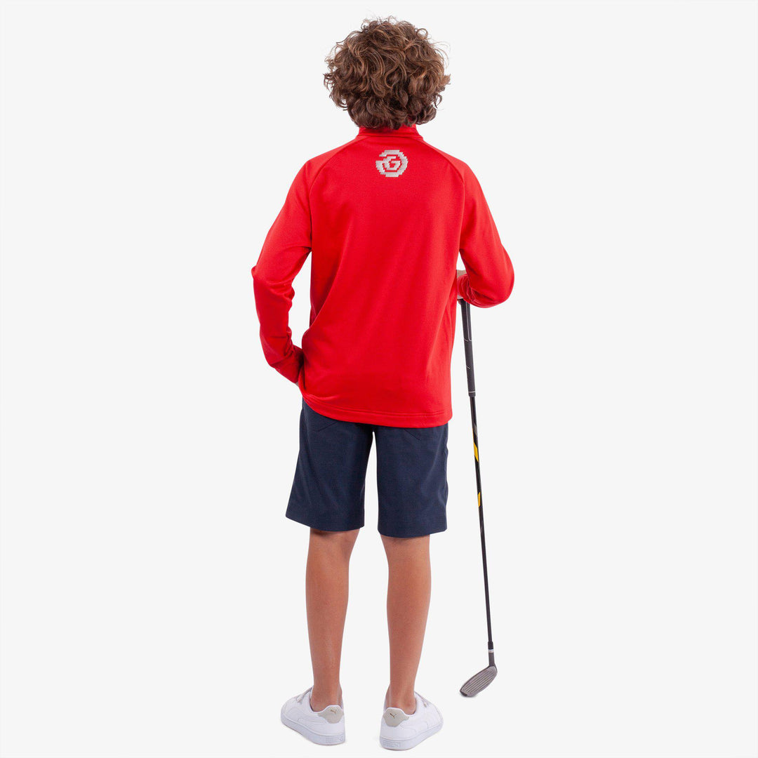 Raz is a Insulating golf mid layer for Juniors in the color Red(6)