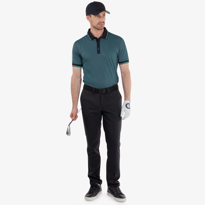 Miller is a Breathable short sleeve golf shirt for Men in the color Black/Atlantis Green(2)