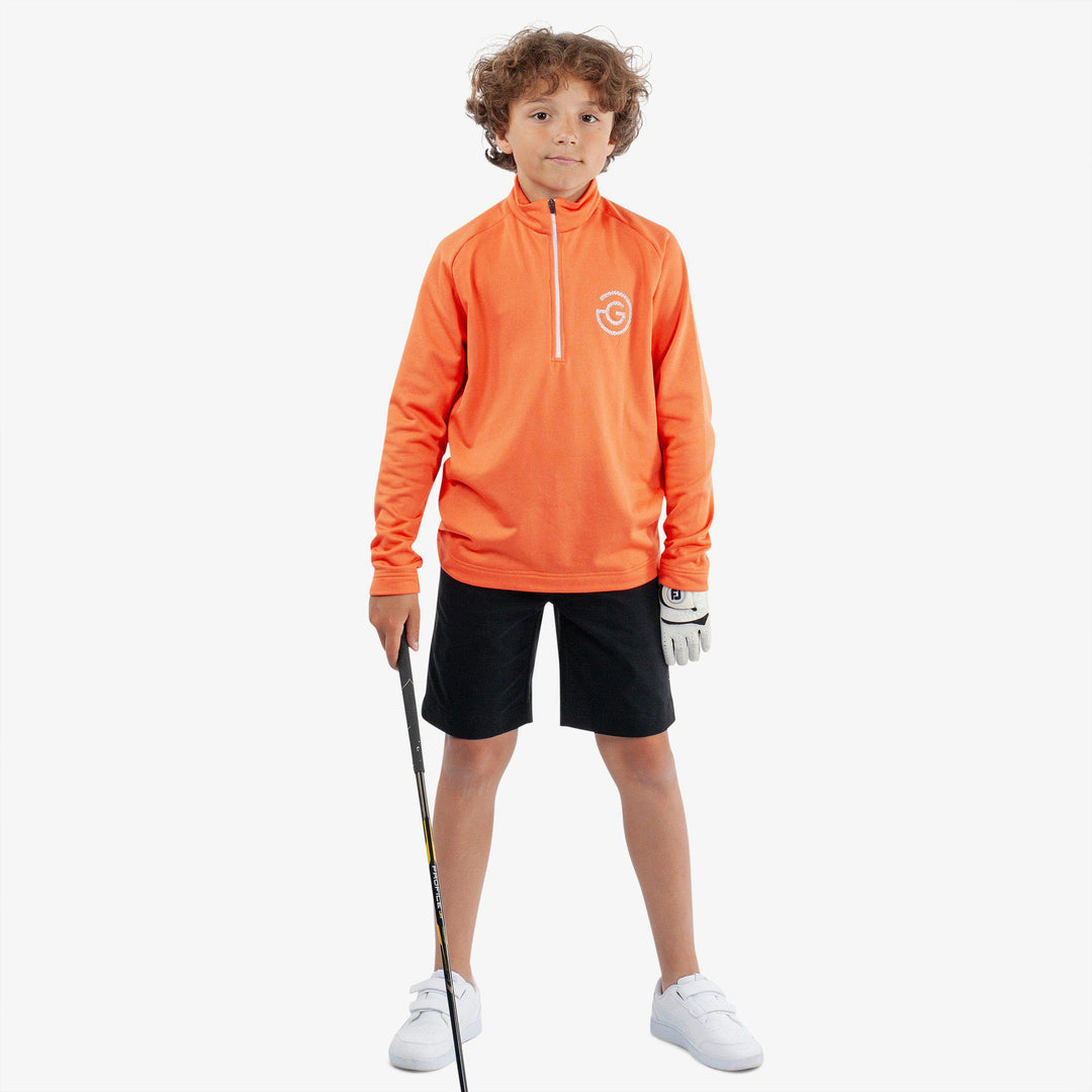 Raz is a Insulating golf mid layer for Juniors in the color Orange(2)