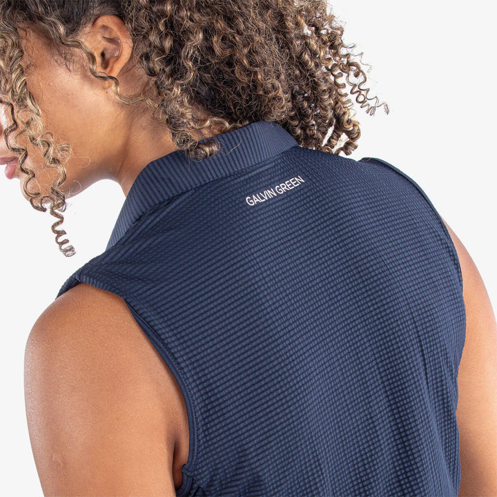 Mayla is a BREATHABLE SLEEVELESS GOLF SHIRT for Women in the color Navy(5)