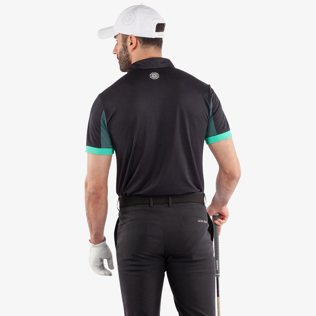 Mills is a Breathable short sleeve golf shirt for Men in the color Black/Atlantis Green(4)