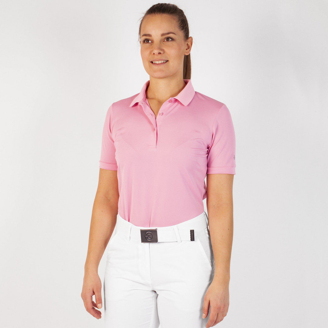 Mireya is a Breathable short sleeve golf shirt for Women in the color Sugar Coral(1)