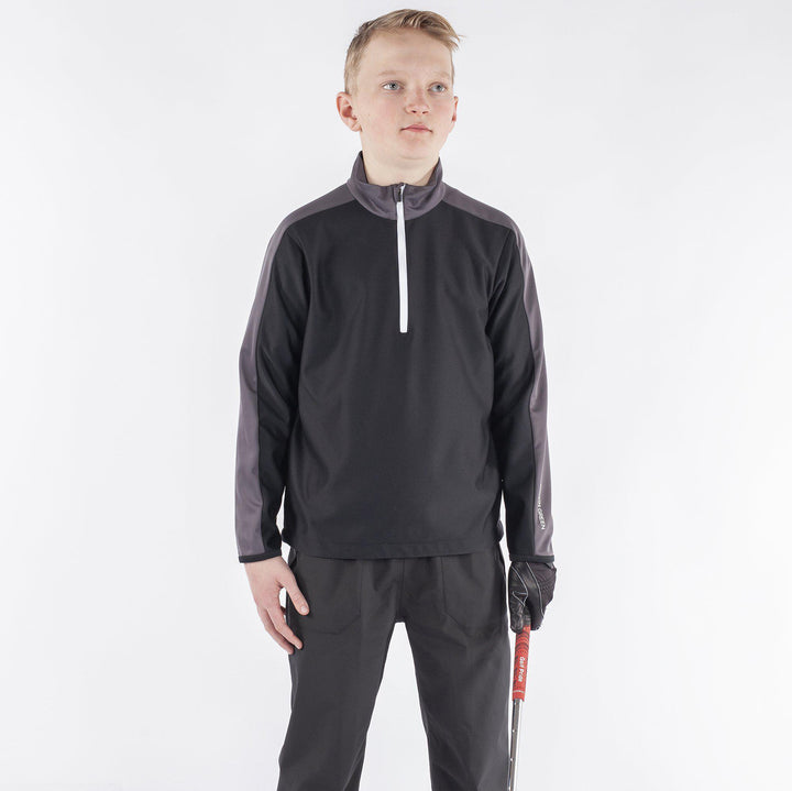 Roma is a Windproof and water repellent golf jacket for Juniors in the color Black(1)