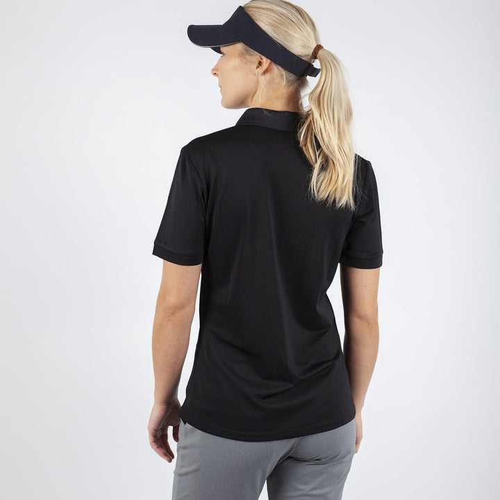 Mireya is a Breathable short sleeve golf shirt for Women in the color Black(3)