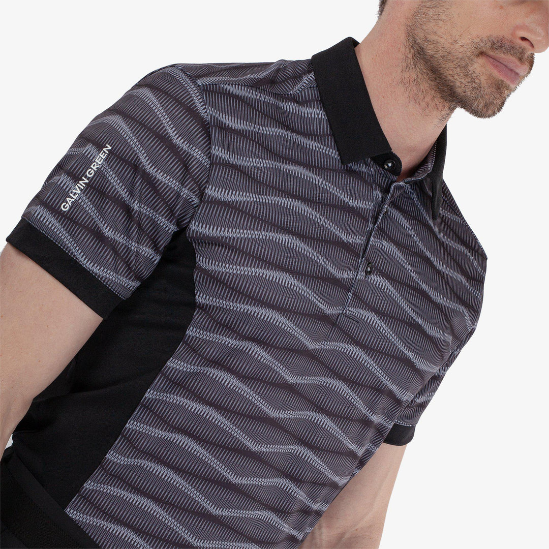 Merlin is a Breathable short sleeve golf shirt for Men in the color Black/Sharkskin(2)