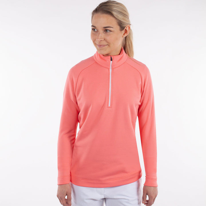 Dolly Upcycled is a Insulating golf mid layer for Women in the color Imaginary Pink(3)