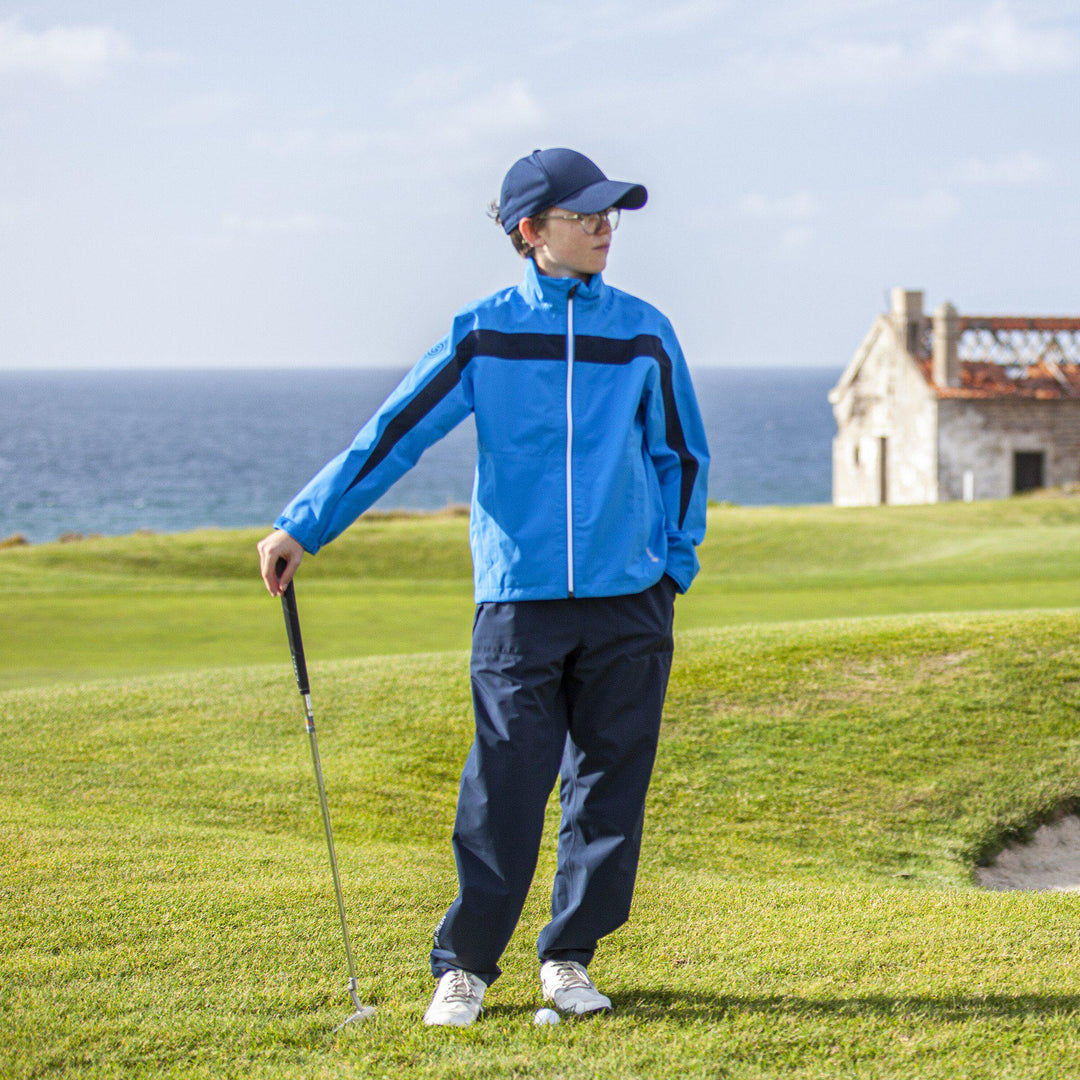 Robert is a Waterproof golf jacket for Juniors in the color Blue/Navy(6)