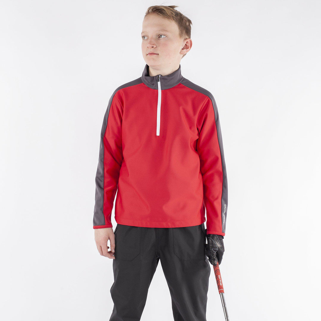 Roma is a Windproof and water repellent golf jacket for Juniors in the color Red(1)