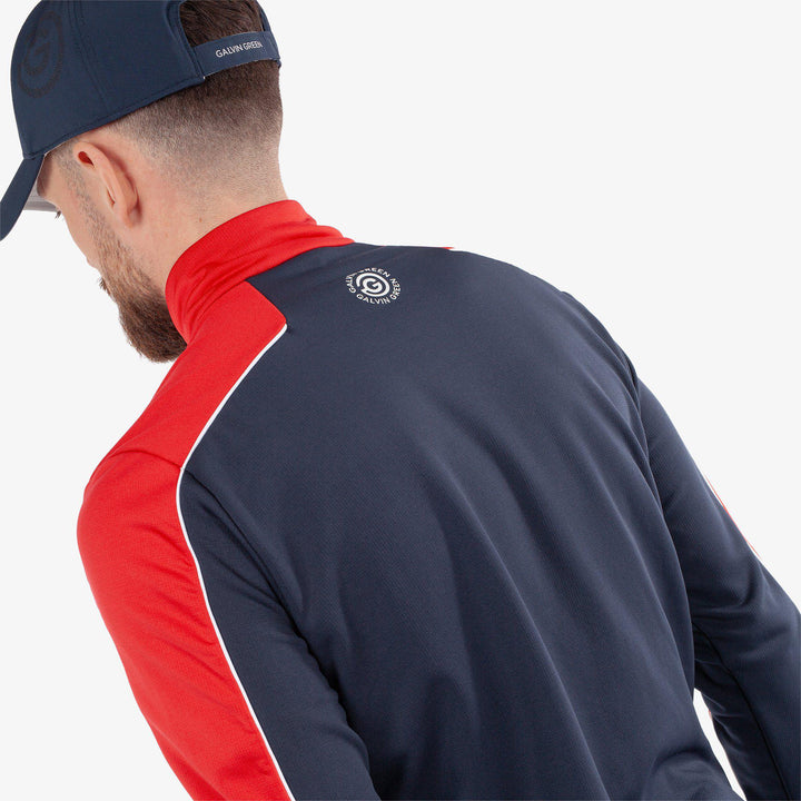 Dave is a Insulating golf mid layer for Men in the color Navy/Red(5)