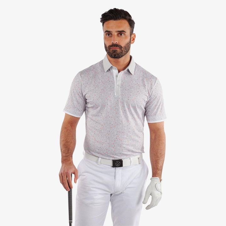 Mannix is a Breathable short sleeve golf shirt for Men in the color Cool Grey/Coral(1)