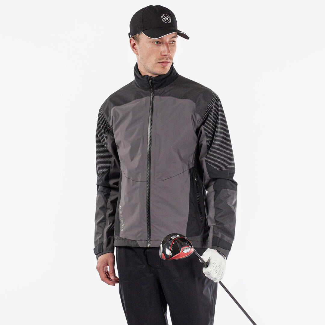 Alister is a Waterproof golf jacket for Men in the color Forged Iron/Black (1)