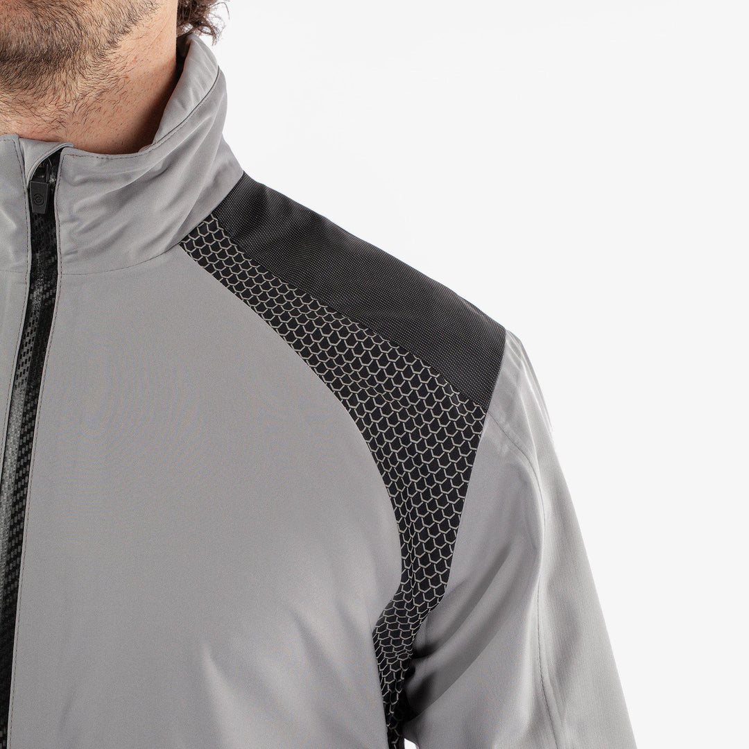 Action is a Waterproof golf jacket for Men in the color Sharkskin(3)