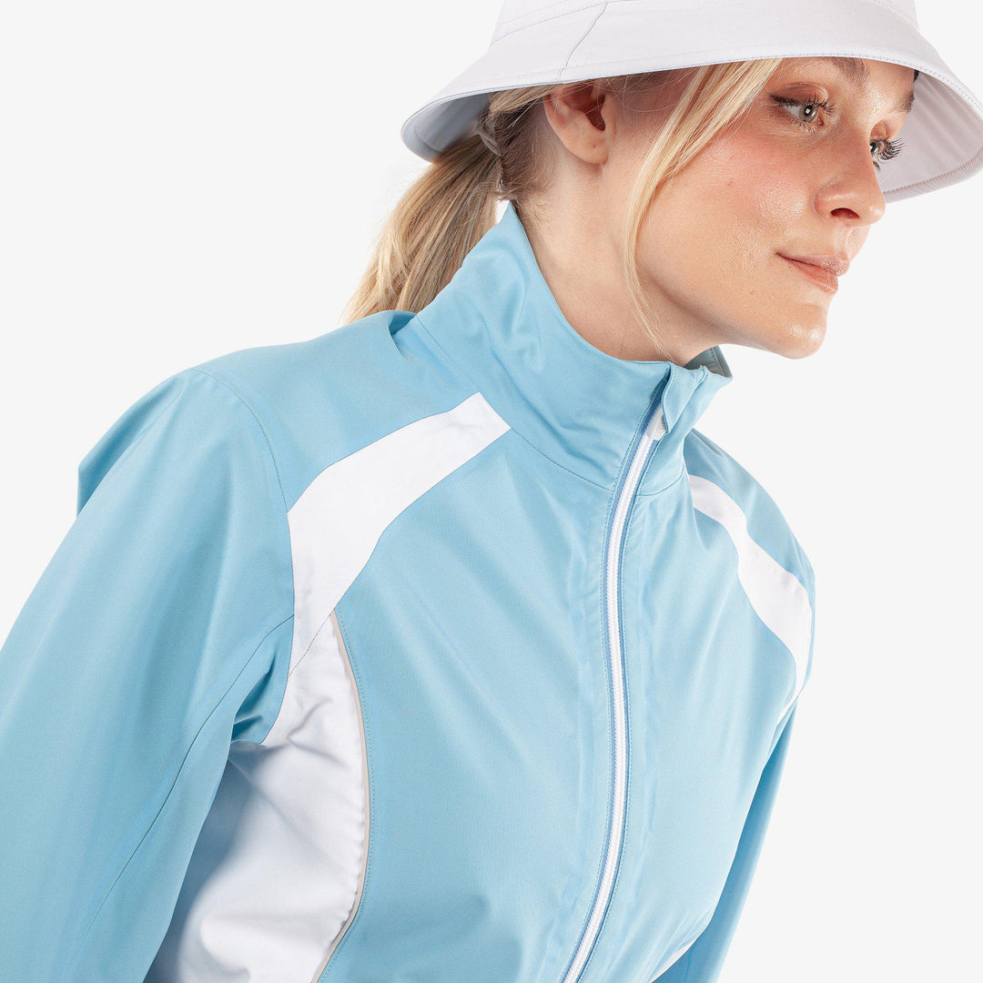 Amy is a Waterproof golf jacket for Women in the color Alaskan Blue/White(3)