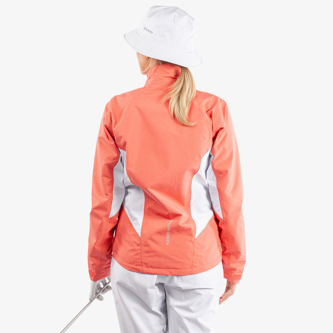 Aida is a Waterproof golf jacket for Women in the color Coral/White/Cool Grey(7)