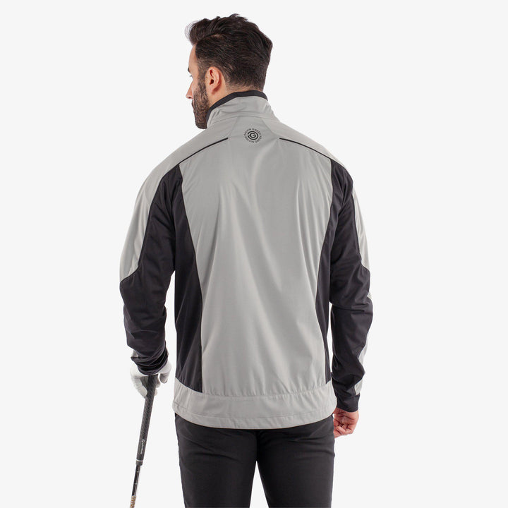 Lyndon is a Windproof and water repellent golf jacket for Men in the color Sharkskin/Black(5)