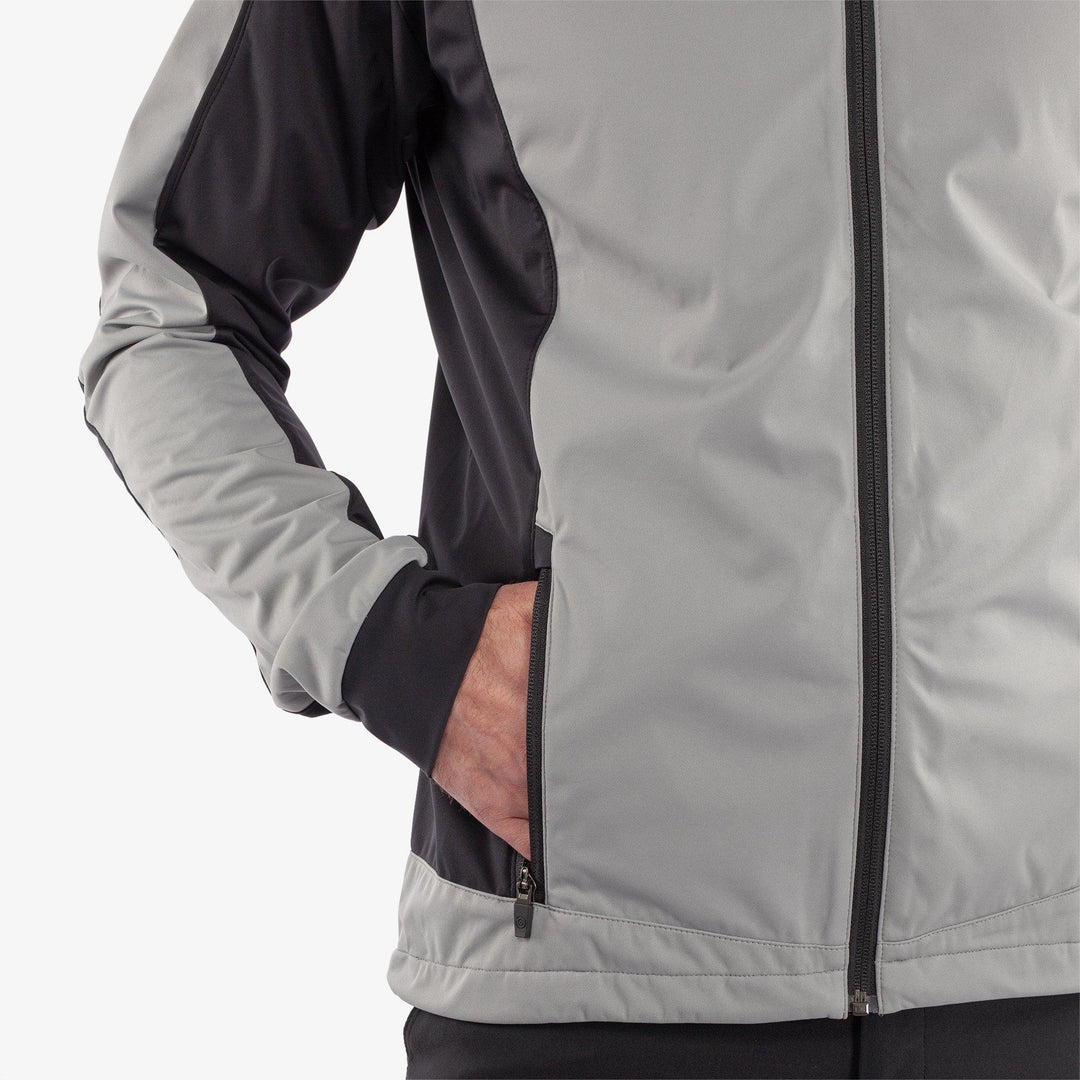 Lyndon is a Windproof and water repellent golf jacket for Men in the color Sharkskin/Black(3)