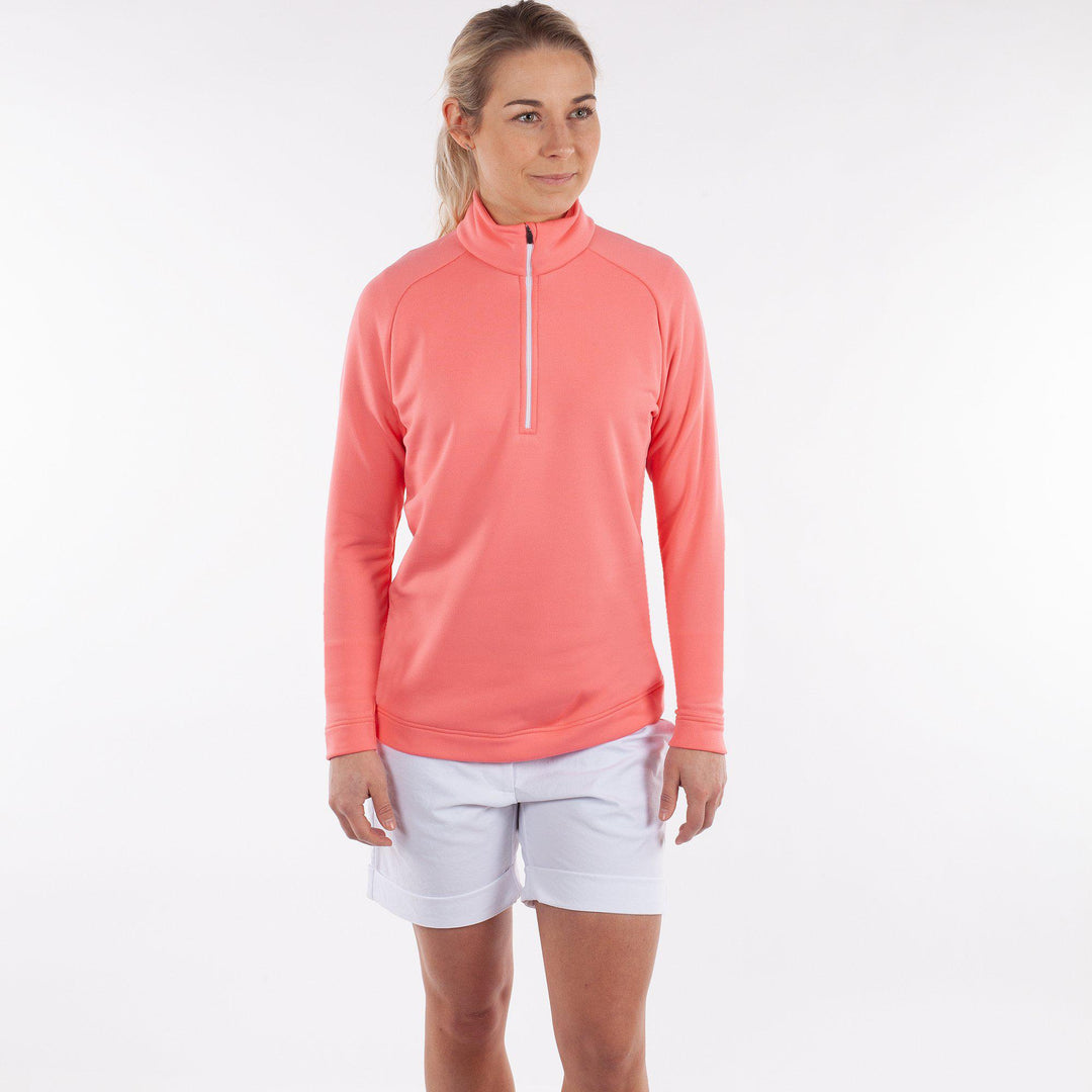 Dolly Upcycled is a Insulating golf mid layer for Women in the color Imaginary Pink(1)