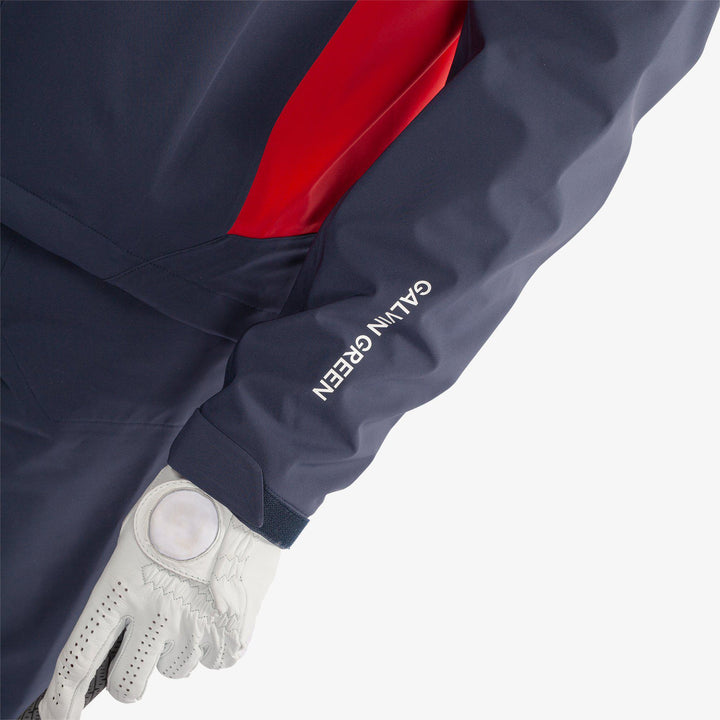 Ames is a Waterproof golf jacket for Men in the color Navy/Red(5)