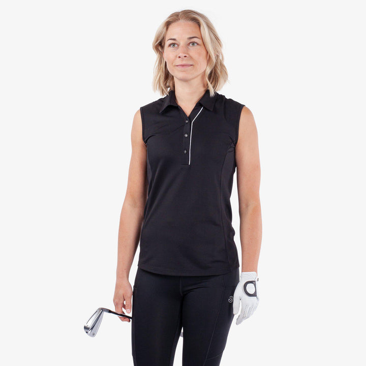 Meg is a Breathable short sleeve golf shirt for Women in the color Black/White(1)