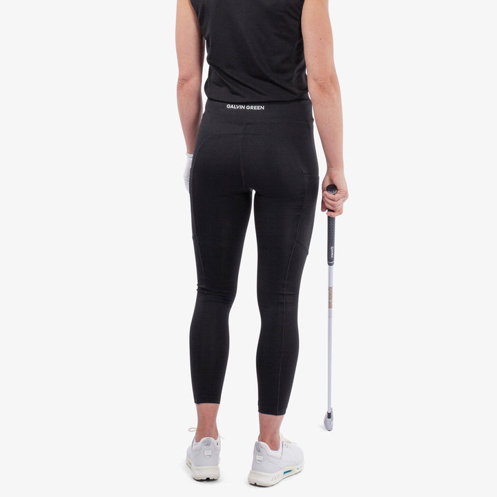 Nicoline is a Breathable and stretchy golf leggings for Women in the color Black(5)