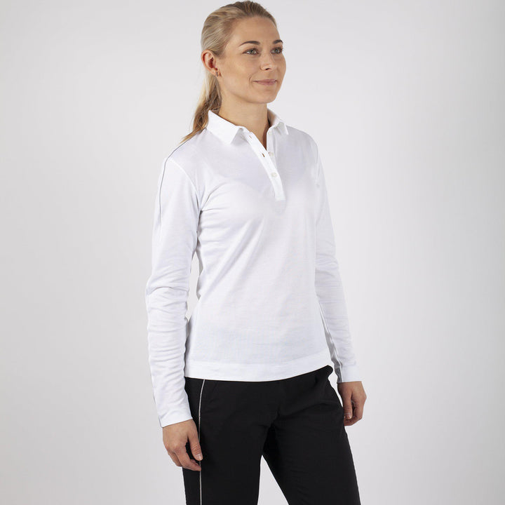 Mary is a Breathable long sleeve golf shirt for Women in the color White(1)