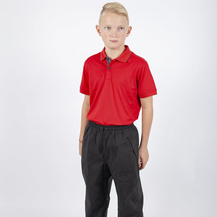 Rod is a Breathable short sleeve golf shirt for Juniors in the color Red(1)