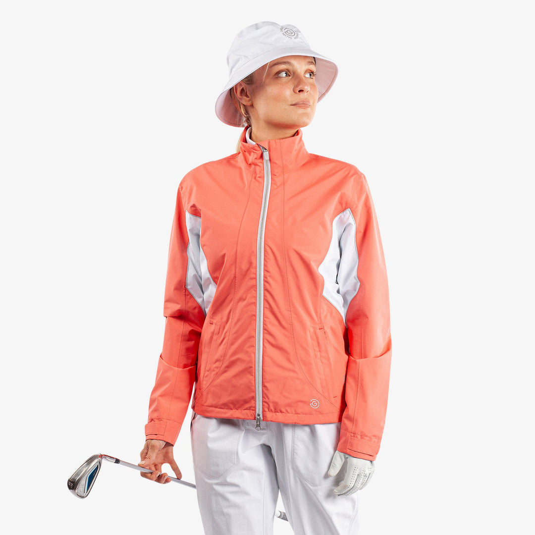 Aida is a Waterproof golf jacket for Women in the color Coral/White/Cool Grey(1)
