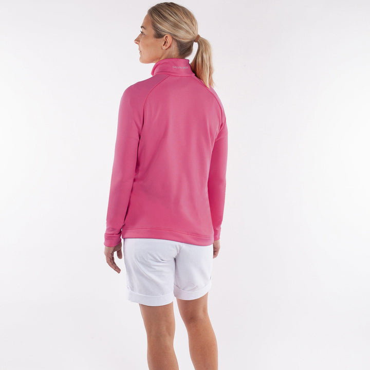 Dolly Upcycled is a Insulating golf mid layer for Women in the color Sugar Coral(5)