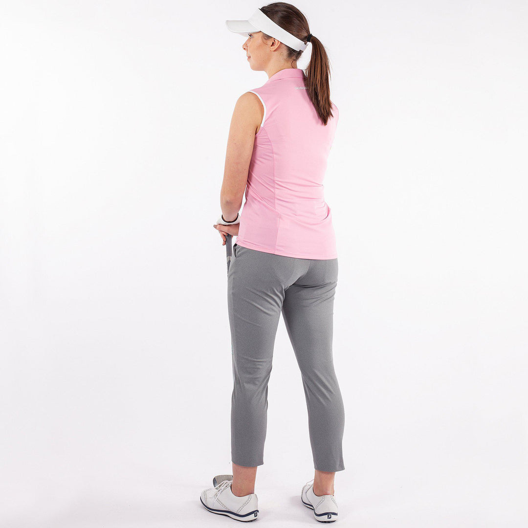 Mila is a Breathable sleeveless golf shirt for Women in the color Amazing Pink(5)