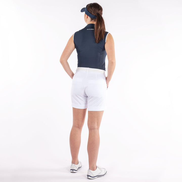Mila is a Breathable sleeveless golf shirt for Women in the color Navy(4)