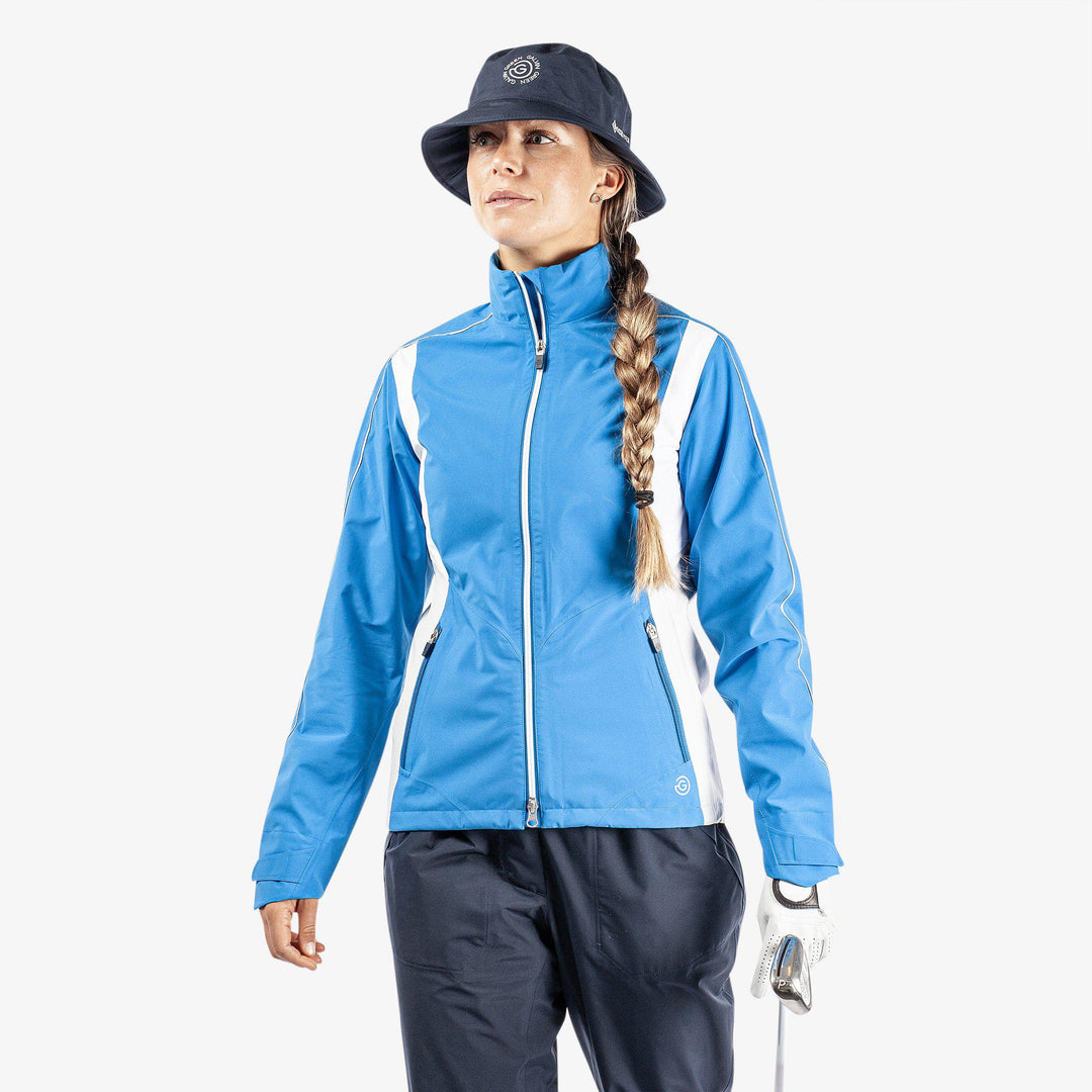 Ally is a Waterproof golf jacket for Women in the color Blue/Cool Grey/White(1)