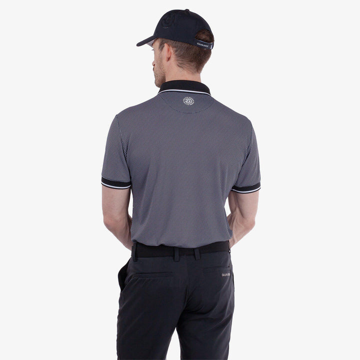 Miller is a Breathable short sleeve golf shirt for Men in the color Black/White(5)