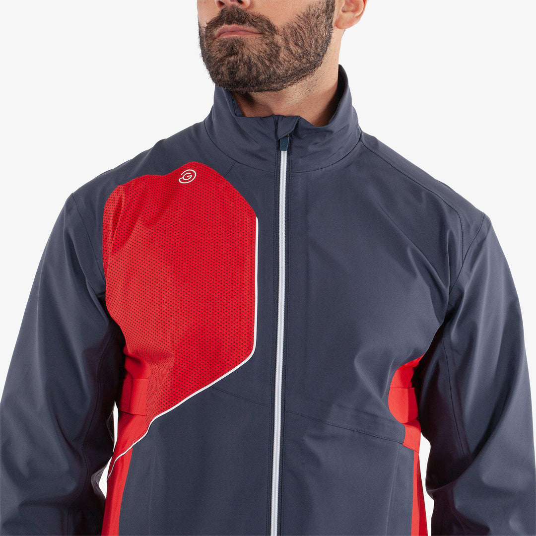 Ames is a Waterproof golf jacket for Men in the color Navy/Red(3)