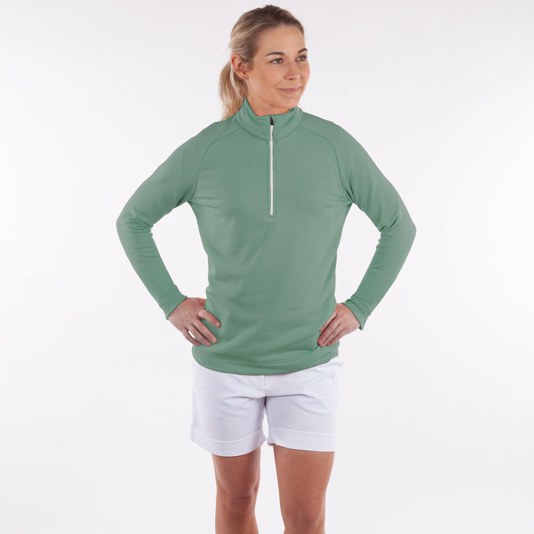 Dolly Upcycled is a Insulating golf mid layer for Women in the color Golf Green(3)