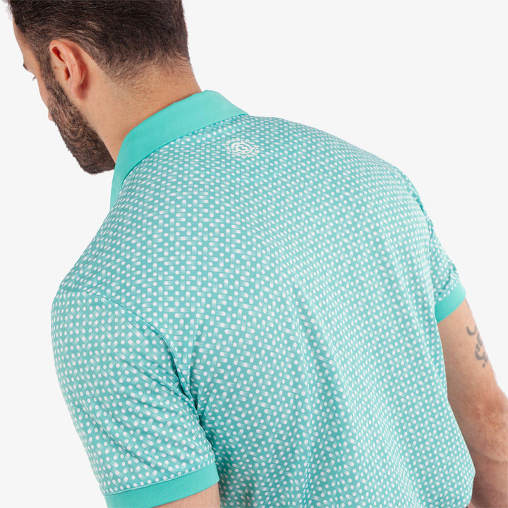 Melvin is a Breathable short sleeve golf shirt for Men in the color Atlantis Green/White(6)
