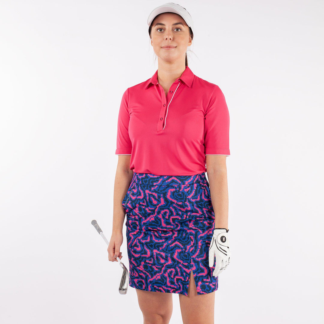 Marissa is a Breathable short sleeve golf shirt for Women in the color Sugar Coral(1)