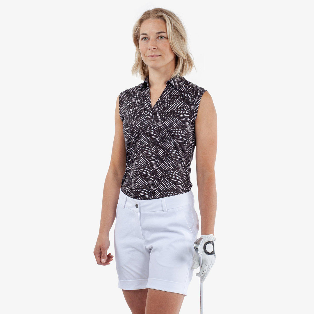 Minnie is a BREATHABLE SLEEVELESS GOLF SHIRT for Women in the color Black/White(1)