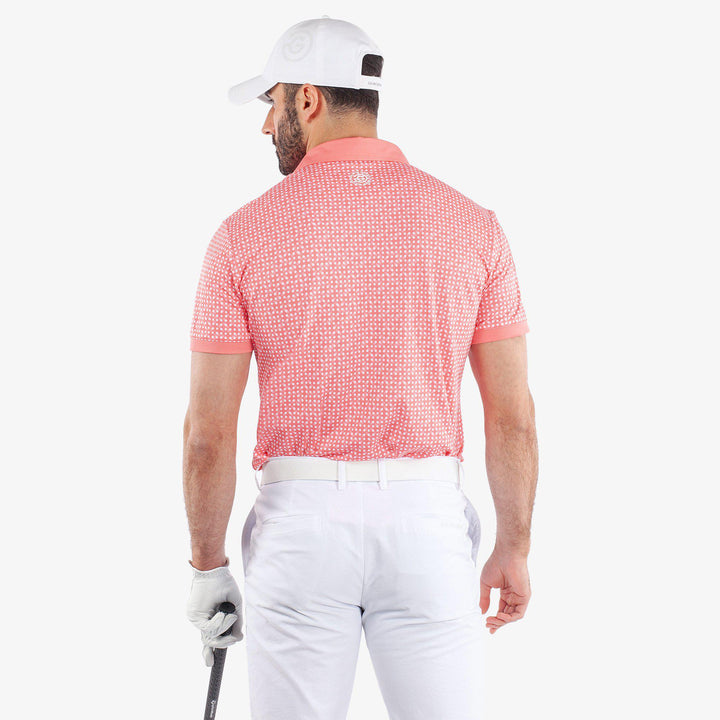 Melvin is a Breathable short sleeve golf shirt for Men in the color Coral/White (4)